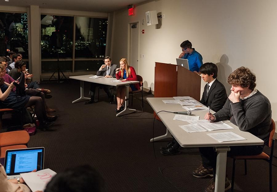 Megan Powers, Vice President of the NYU College Republicans, second from left, rebuts the stance taken on ISIL by her Democratic counterpart.