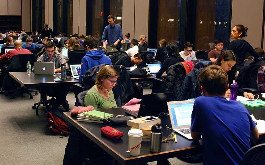 Students study on the fifth floor of Bobst as finals approach.