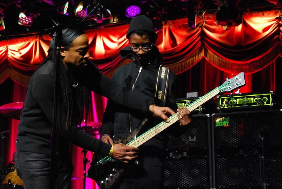 Doug Wimbish of Living Colour, left, passes on wisdom to fellow bassist Alec Atkins of Unlocking the Truth before the show in the Brooklyn Bowl.
