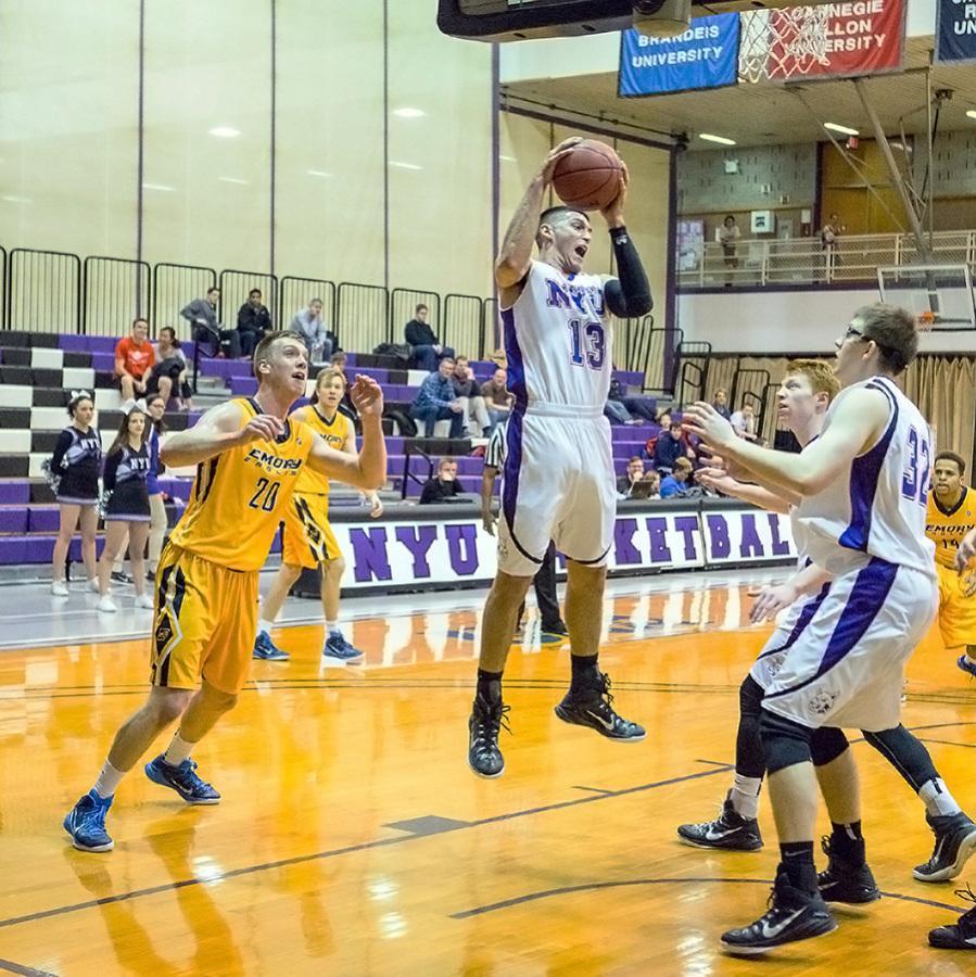 Evan Kupferberg shoots during a game against Emory. 