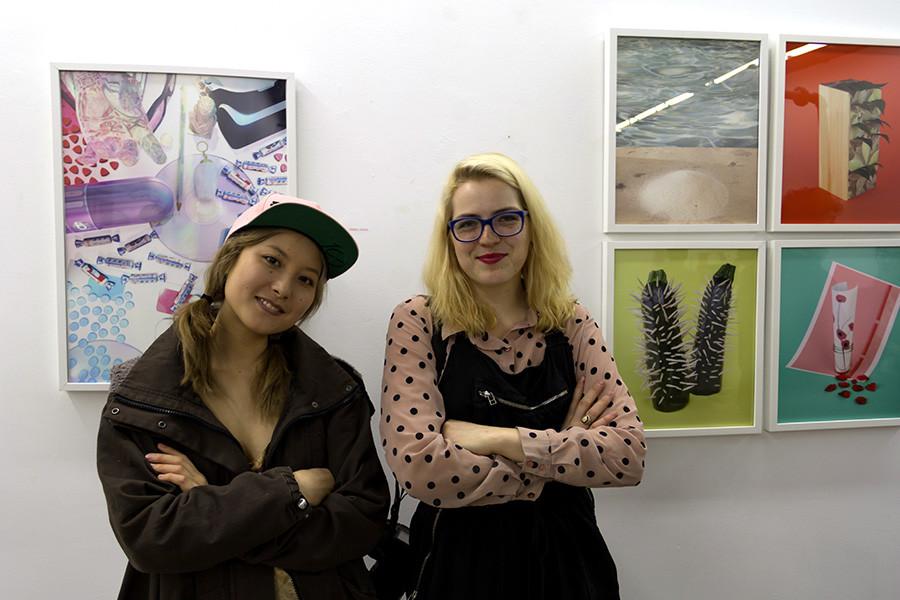 Emily Jampel, left, and Sophie Epstein hosted HELLOWORLD, a gallery showcasing the work of artists under 25. Jampel and Epstein will release their book, White Rabbit, on Thursday.
