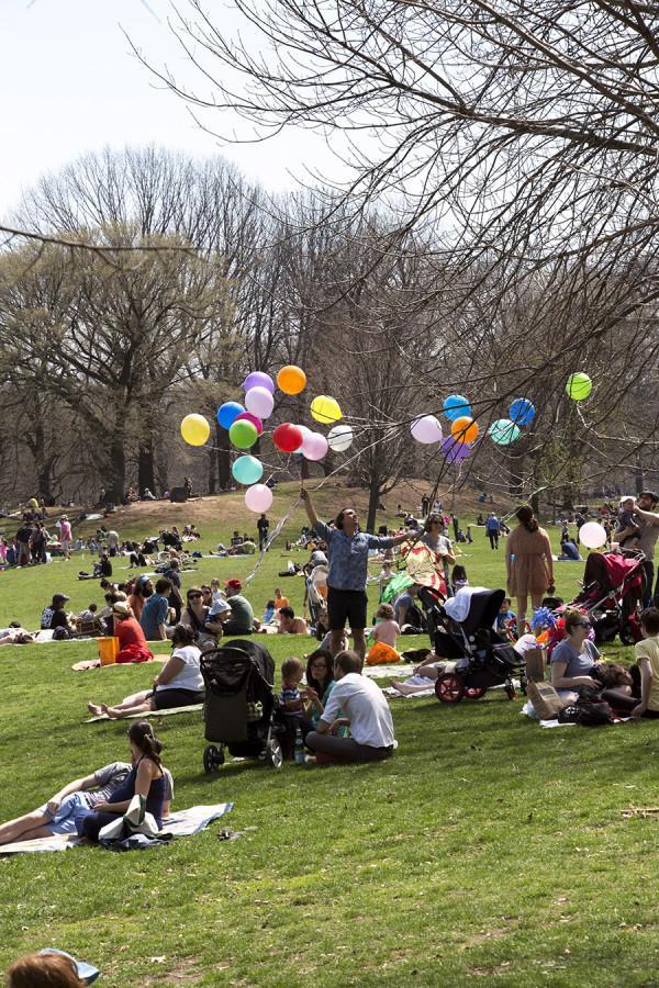 People relax in Prospect Park on a beautiful April day.
