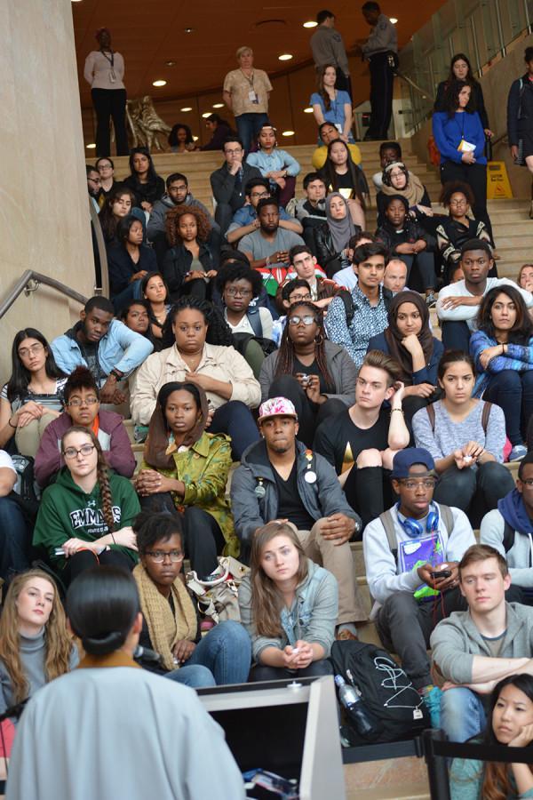 Students+listen+during+a+vigil+for+the+Kenyan+students+slain+at+Garissa+University+College+last+Thursday.+The+vigil+started+on+the+steps+of+Kimmel%2C+where+mourners+took+a+five+minute+moment+of+silence+and+heard+from+a+number+of+religious+groups.+Following+the+speeches%2C+the+group+walked+quietly+to+the+square+to+set+candles+in+the+fountain.