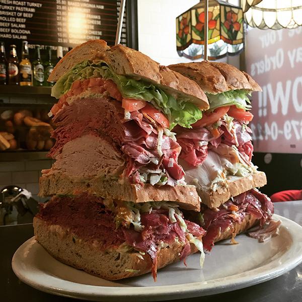 On 3rd and 37th Street, Sarge’s Deli offers a monster sandwich topped with Corned Beef, Pastrami, Roast Beef, Fresh Turkey, Salami, Sliced Tomato, Lettuce, Cole Slaw & Russian Dressing, weighing 4.5 pounds.