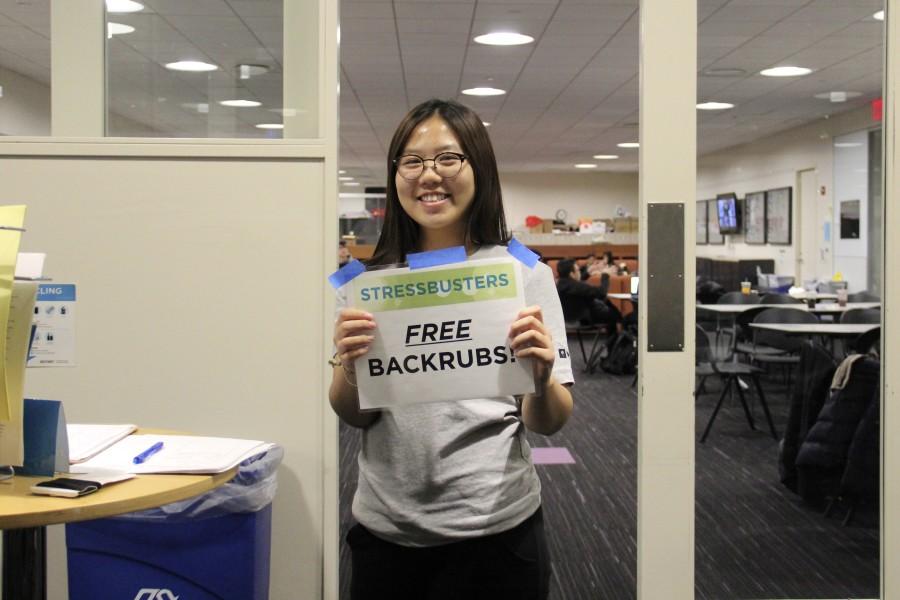 Stressbusters volunteer, Catherine Kim, offers free back rubs at Take a Break Tuesday in the Kimmel Center for University Life on Nov. 24, 2015. 