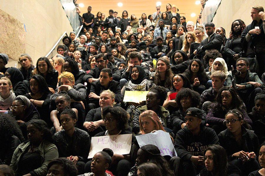 A+crowd+of+students+and+faculty+filled+the+lobby+of+Kimmel+Center+on+Monday+evening+in+a+show+of+solidarity+for+students+of+color.