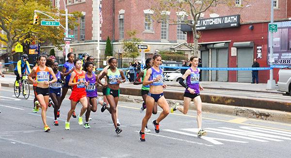 Runners looking determined in the TCS New York City Marathon on the 1st of November, 2015. 