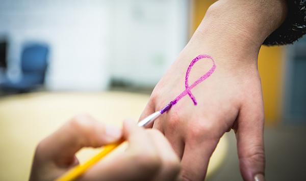 Colleges Against Cancer at NYU launches Paint the Campus Purple week today, to commemorate those who have lost their lives in the battle against cancer and continue to fight against the disease. 