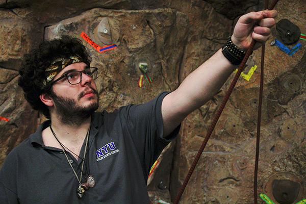 Jeremy Eckl at work by the Rock Wall in
Palladium Athletic Facility.