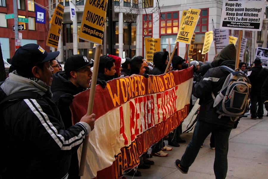 Union members waved pickets in English and Spanish outside Bröd Kitchen on Friday afternoon.