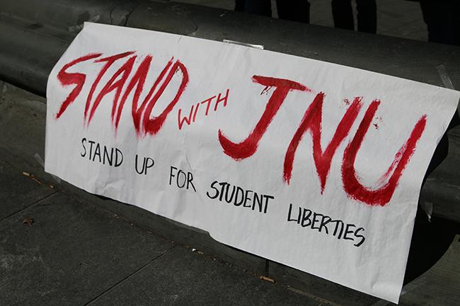 Students from NYU and Cooper Union gathered at Washington Square Park to stand in solidarity with JNU.