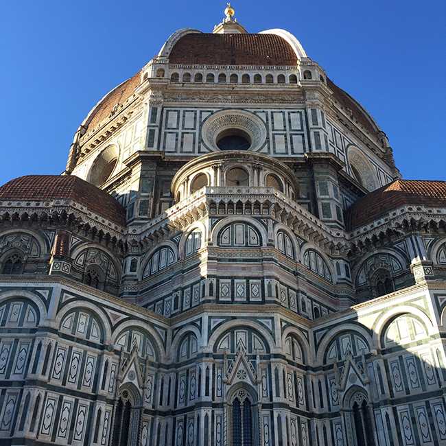 A view of the Duomo in Florence on a clear day.