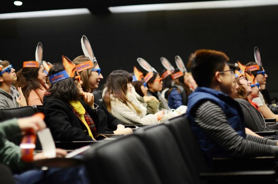 Students wearing Zootopia-themed masks enjoy a presentation by animator Darrin Butters at the Cantor Film Center on February 25. 