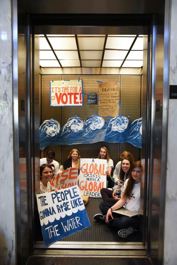 NYU Divest members occupied part of the first floor of Bobst Library, blocking the elevator that leads to executive offices on Monday, April 18, demanding to meet with the Board of Trustees who would vote on divestment at their next meeting.