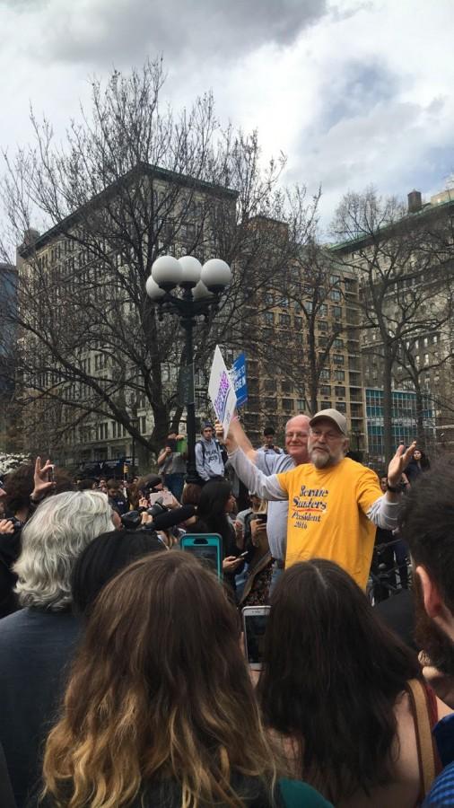 Ben Cohen and Jerry Greenfield introduce their new ice cream flavor, Bernies Yearning to people in Washington Square Park. 