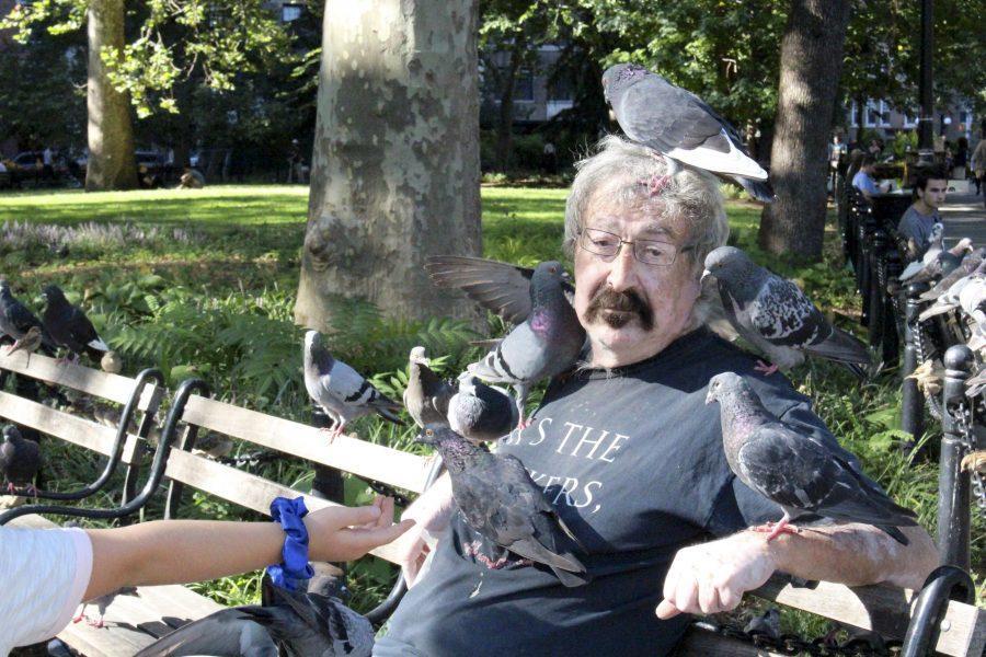 Paul the pigeon man of Washington Square Park feeds his friends.