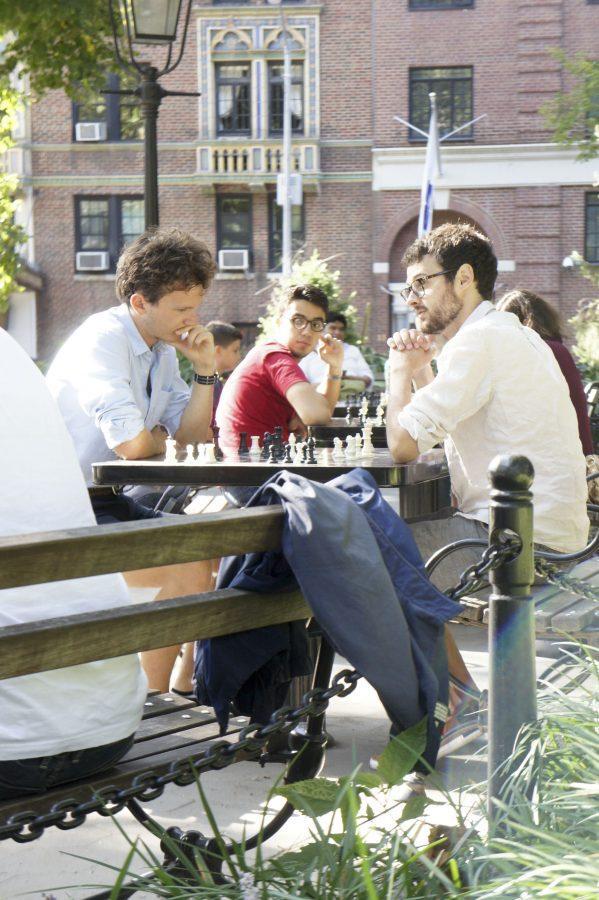 May 16th, Washington Square Park. A beautiful sunny day where several tables were occupied by chess players, concentration and focus is the key to win. 
