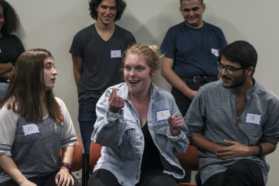 Students audition for improv groups, thown into a scene on the spot to test their creativity.
