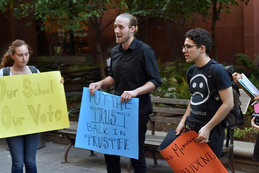 Student activists gather outside of Bobst, where they remained chanting while organizers entered into the library to speak with the University representatives.