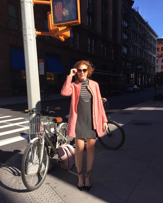 Camille Larkins attempted to dress like Carrie Bradshaw for a week. For the first day, she chose a business-casual dress inspired by an outfit in season 5 of Sex and the City.