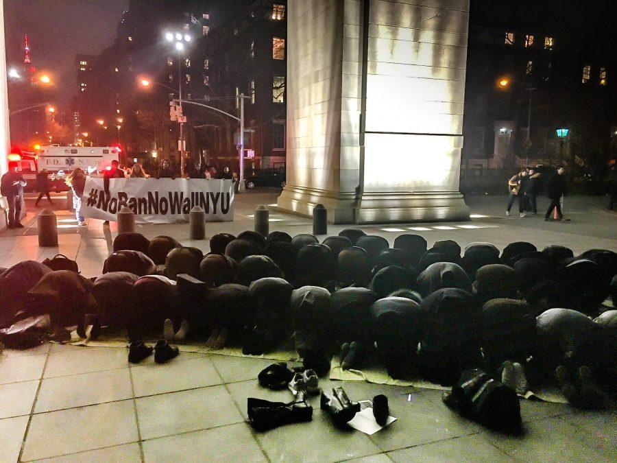 Members of the MSA rally kneel in prayer by the Washington Square Arch to peacefully demonstrate their religious devotion despite the hateful rhetoric surrounding Muslims.