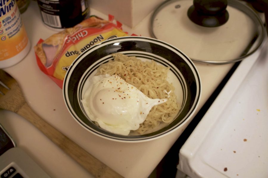 Eating instant ramen everyday can become a bore.  Spice up your life by panfrying it and adding a poached egg.