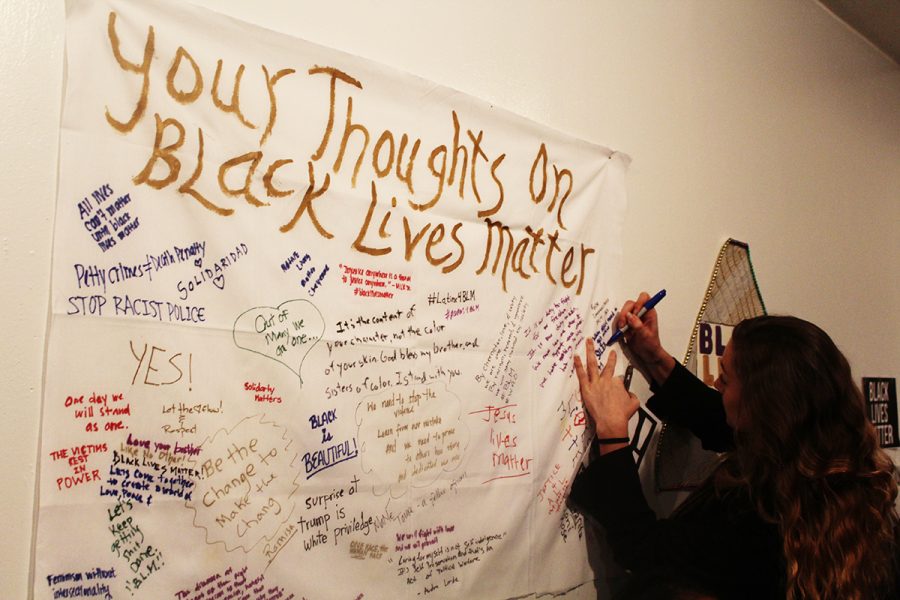 The Black Lives Matter art show presents an interactive art wall at the Living Gallery in Brooklyn