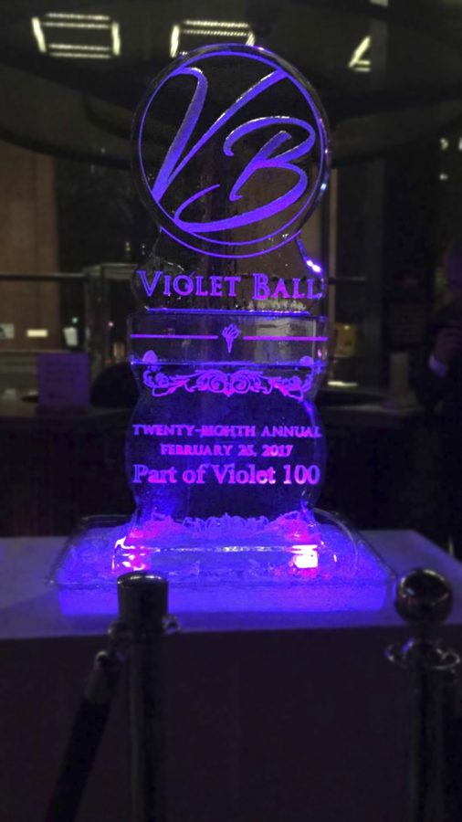 Students+gathered+around+the+ice+sculpture+in+the+atrium+of+Bobst+while+enjoying+the+annual+Violet+Ball.++The+event+took+place+on+Saturday%2C+February+26+as+part+of+Violet+100s+NYU+Spirit+Week.