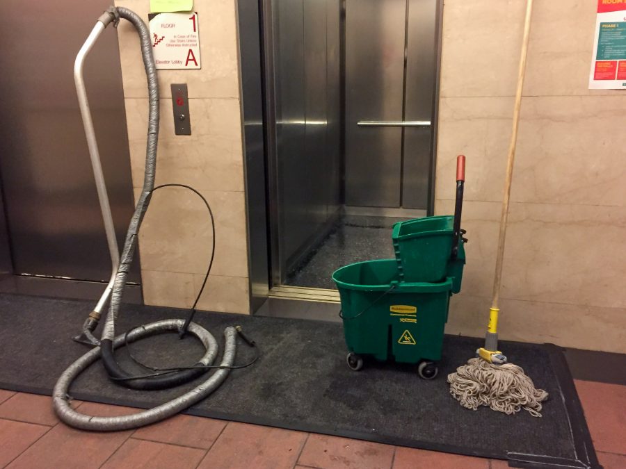 The Palladium Hall elevators being cleaned after water started leaking from the ceilings on Tuesday. The maintenance work has inconvenienced residents who have been forced to use the stairs to navigate the 16 floor building.