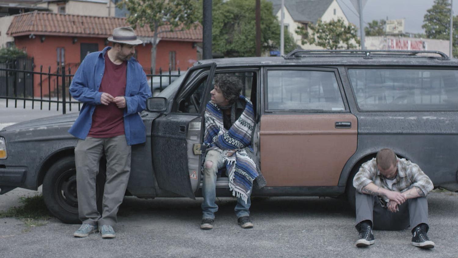 Tommy Swerdlow as Tommy, TJ Bowen as TJ and Blake Heron as Blake chill in the car in “A Thousand Junkies.”