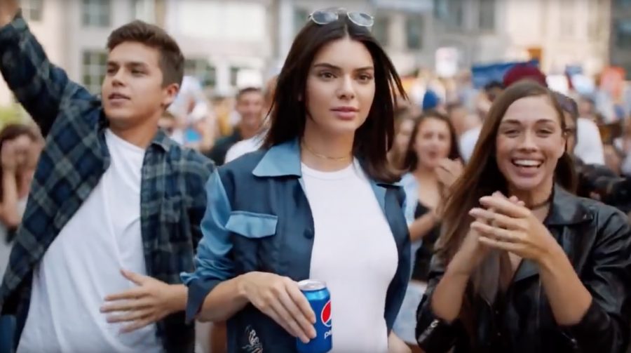 Pepsi%E2%80%99s+recent+commercial+received+a+lot+of+negative+backlash+for+its+tone-deaf+approach+to+social+activism.+Starring+Kendall+Jenner%2C+the+commercial+appropriated+the+struggle+of+minorities+for+its+capitalist+motive.
