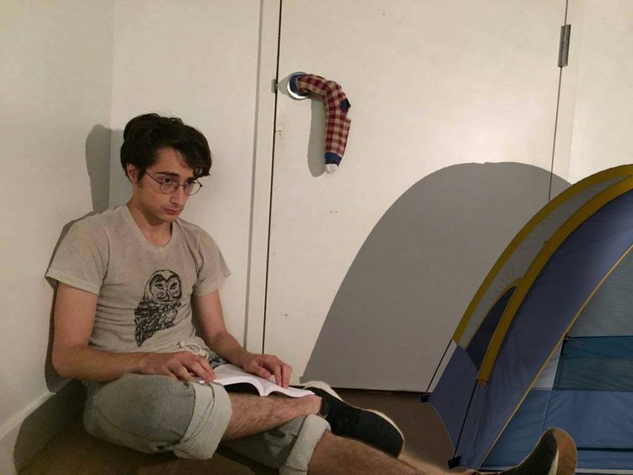 Hopeful senior Chris Stert camps out by door hoping to be first inside his own bedroom.