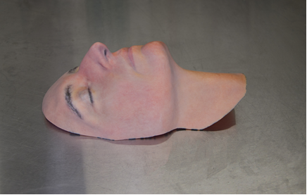 A sample mask, featuring Leslie Bernstein, administrator for the Hansjӧrg Wyss Department of Plastic Surgery and Face Transplant Program at NYU Langone Health.