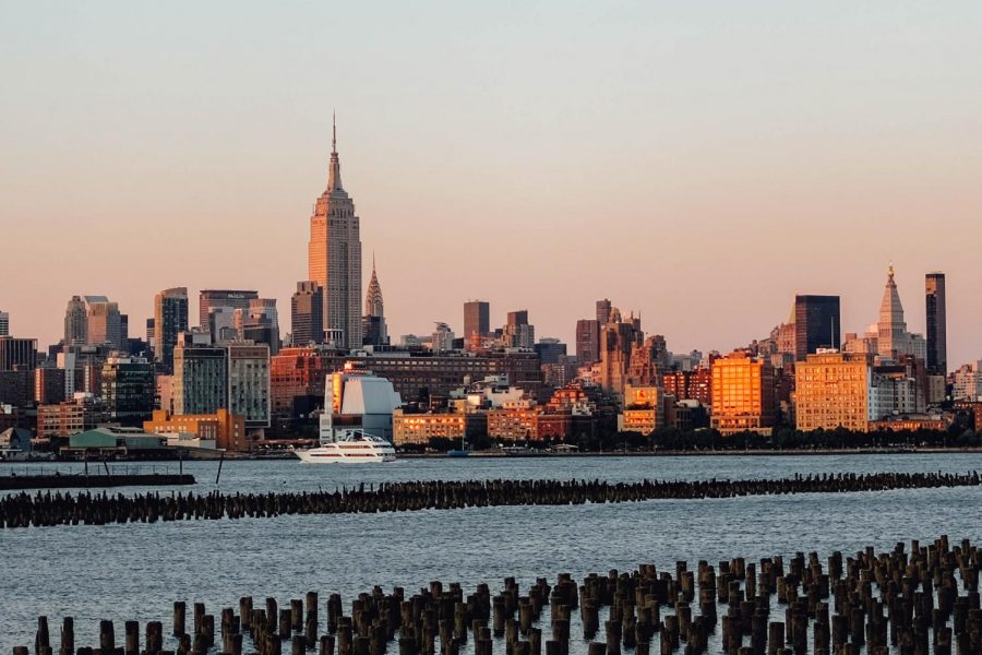 The New York City skyline at sunset.