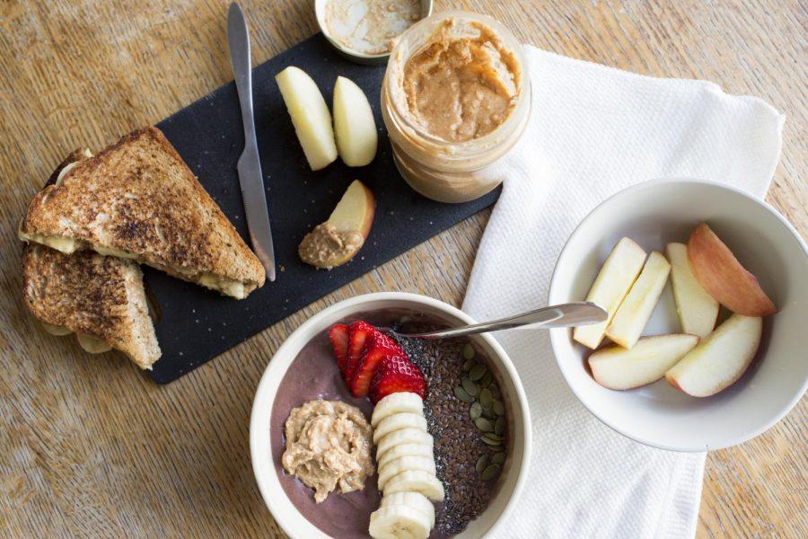 Three ways to incorporate peanut butter into your daily meal are in a sandwich, in a smoothie bowl or as a dip for your apple slices.