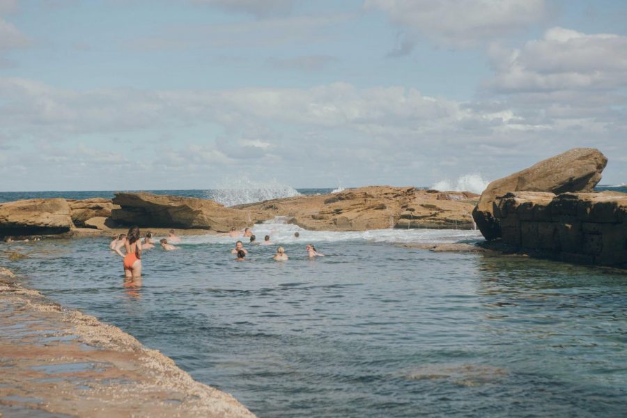 People relax in the rock pools at Coogee Beach in Sydney, Australia.