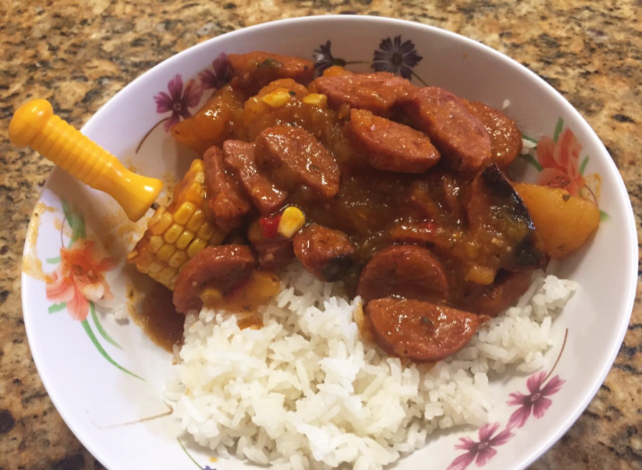 Laura Rubio’s family recipe for Cuban guiso: kielbasa sausage, sweet corn, potatoes and pumpkin over white rice.