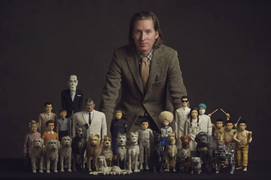 Isle of Dogs director Wes Anderson with his miniature cast of dogs, heroes and villains.