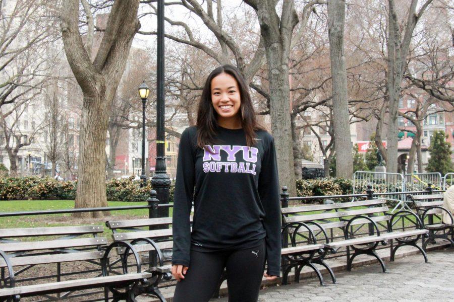 Steinhardt junior Diana King in Washington Square Park. King excels as pitcher and centerfielder for the softball team.