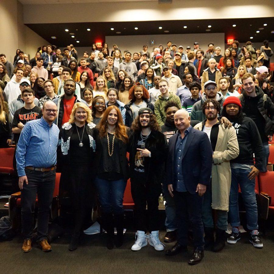 Students and faculty who attended Steinhardt’s Q&A with DIY rapper Russ pose for a photo following the one-hour session.