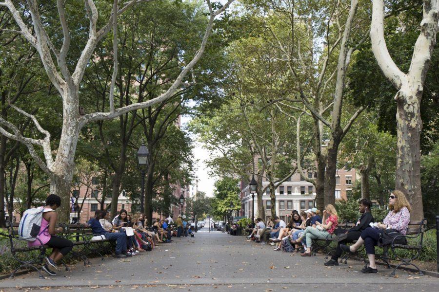 People+enjoying+the+weather+in+Washington+Square+Park.+While+not+stereotypically+productive%2C+it+can+be+beneficial+for+the+body+and+mind+to+go+for+a+walk.+%28Photo+by+Katie+Peurrung%29
