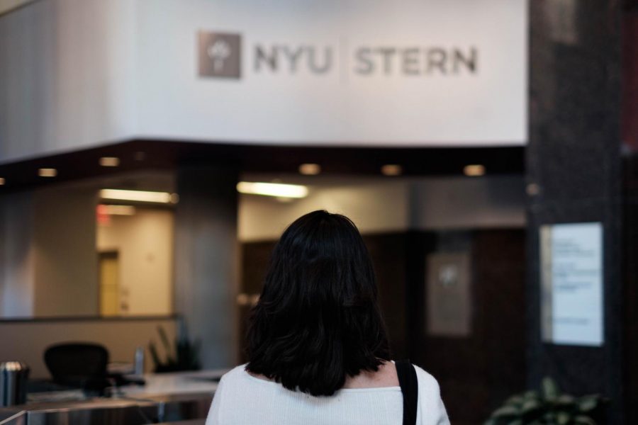 A Muslim student standing in the lobby of the Henry Kaufman Management Center. Stern has recently gained attention from the larger NYU community due to instances of Islamophobia and discrimination. 