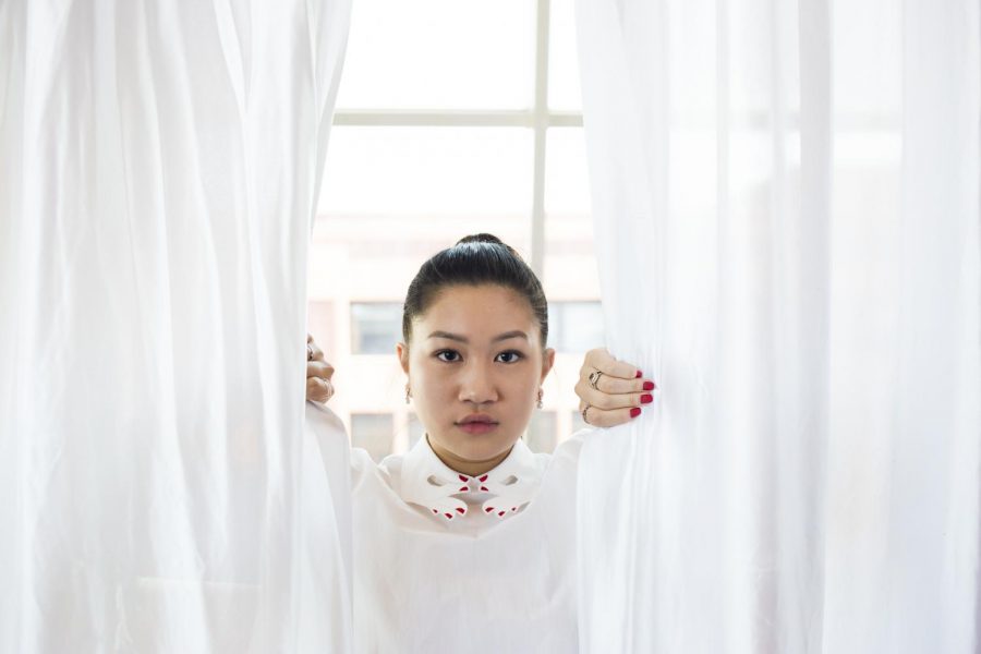 School of Professional Studies first-year Sarabeth Wong poses with curtains in a Vivetta dress after the show.