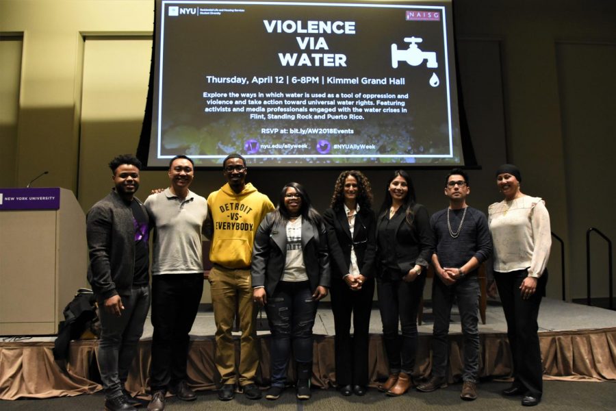 The panelists at the Violence Via Water event in Kimmel Grand Hall pose for a photo.
