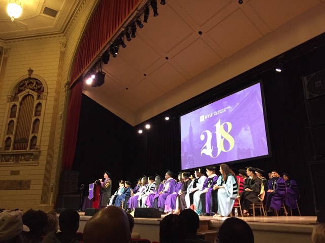 President Andrew Hamilton addresses graduates and their families at the College of Global Public Health commencement ceremony held in The Town Hall in midtown.