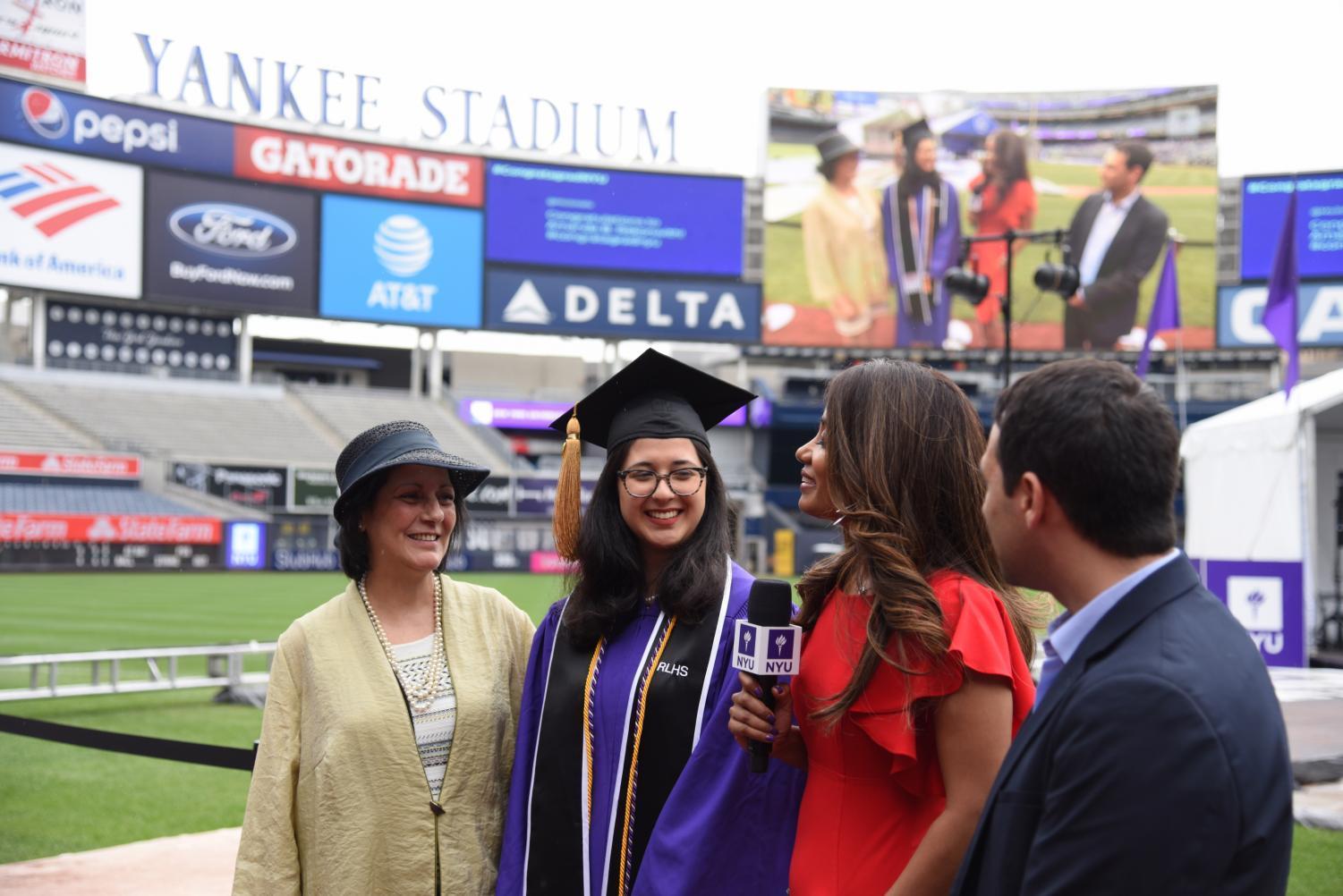 NYUs+Class+of+2018+Shines+Through+the+Showers+at+186th+Commencement