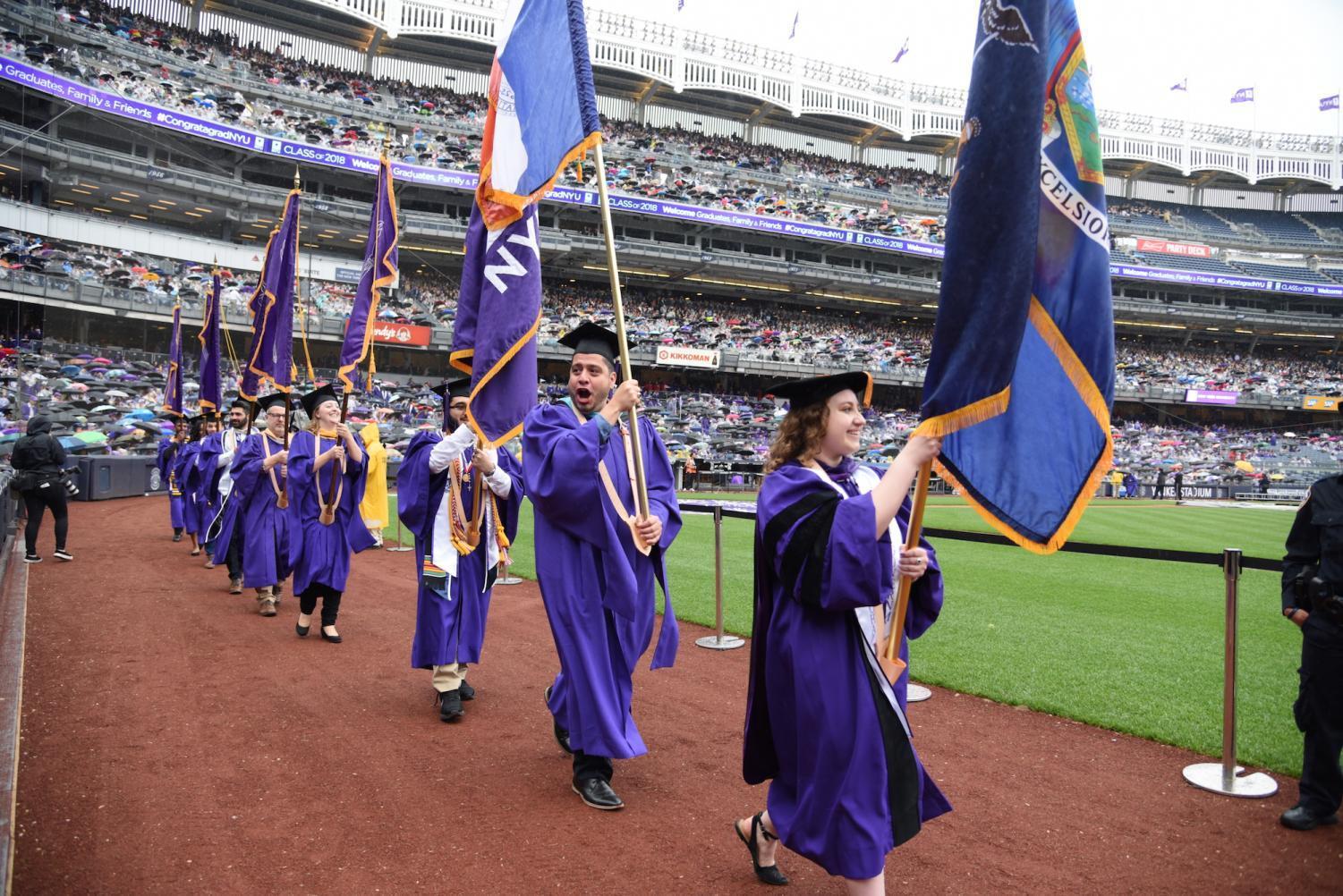 NYUs+Class+of+2018+Shines+Through+the+Showers+at+186th+Commencement
