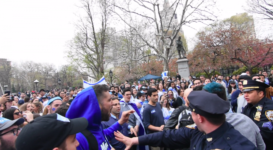 A fight broke out in Washington Square Park during a rave for Israel’s Independence Day in April 2018. Supporters of Israel clashed with pro-Palestine protestors. (Courtesy of Ido Siman Tov)