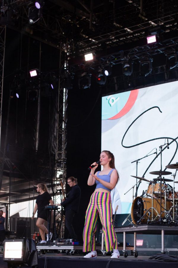 Norwegian artist Sigrid bopped around the Pavilion Stage in her colorfully striped pants and flouncing pony tail.