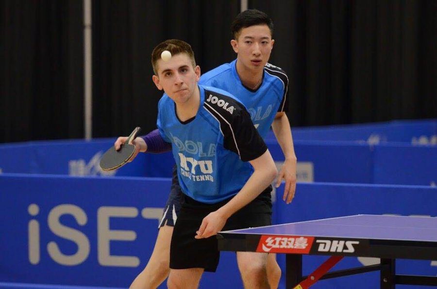 Adar Alguetti (front) and Yijun (Tom) Feng play doubles at the 2018 iSET College Table Tennis National Championships.